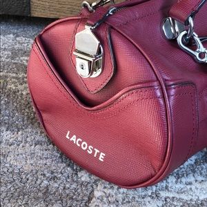 Lacoste cylinder purse